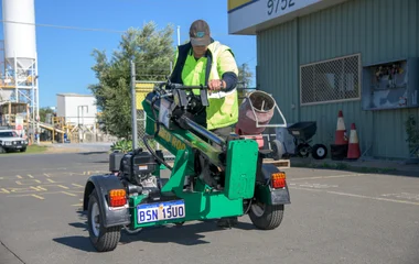 Renting v Buying Equipment photo of one of our team getting our log splitter ready to hire. 